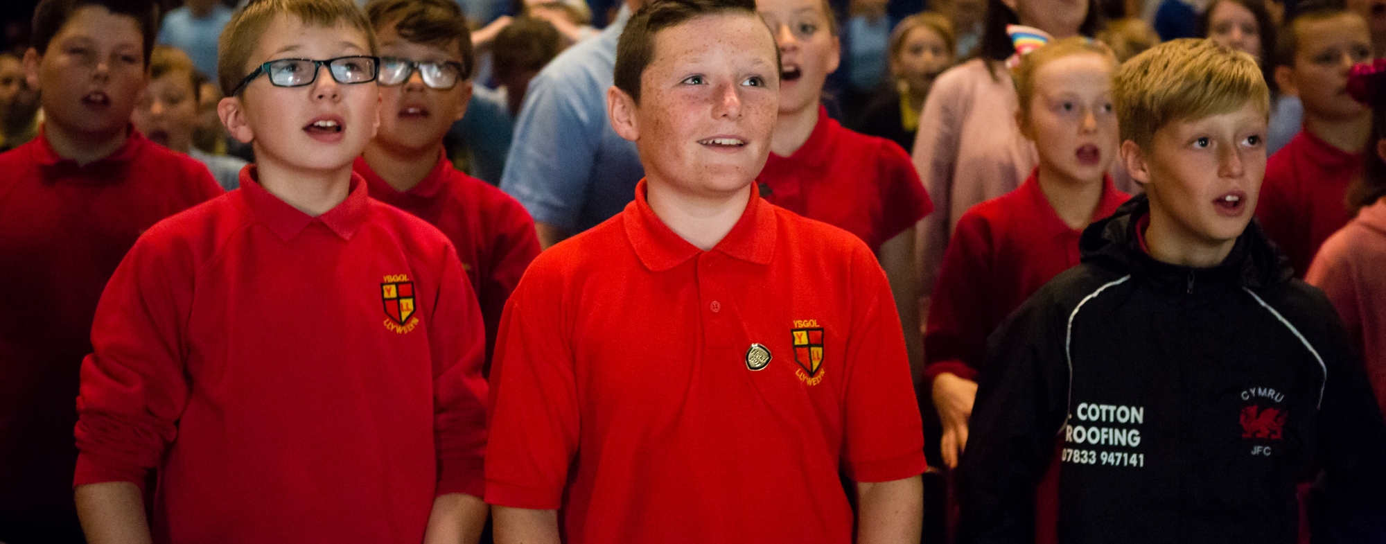 Can Sing Celebration Llandudno 15 June 2017 credit Paul Sampson 110 Paul Sampson A large group of school children singing, three boys in the foreground.
