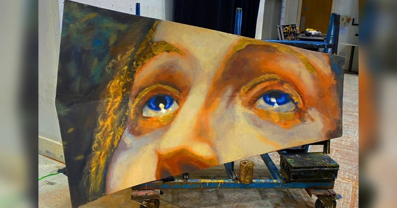 A backstage photo of the fresco of Mary Magdalene on its own. The fresco displays her eyes, which gaze upwards, and nose.